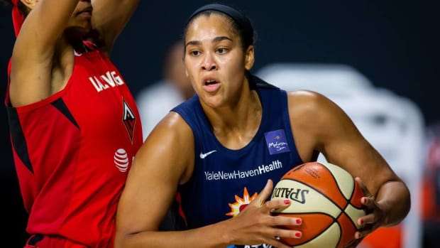 Connecticut Sun center Brionna Jones drives with the ball in a game vs. the Las Vegas Aces.